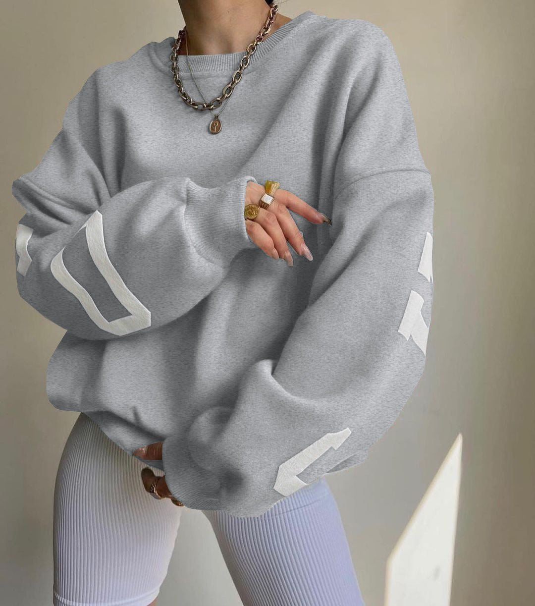 Sweaters de manga larga en espesas de impresión fría para mujeres