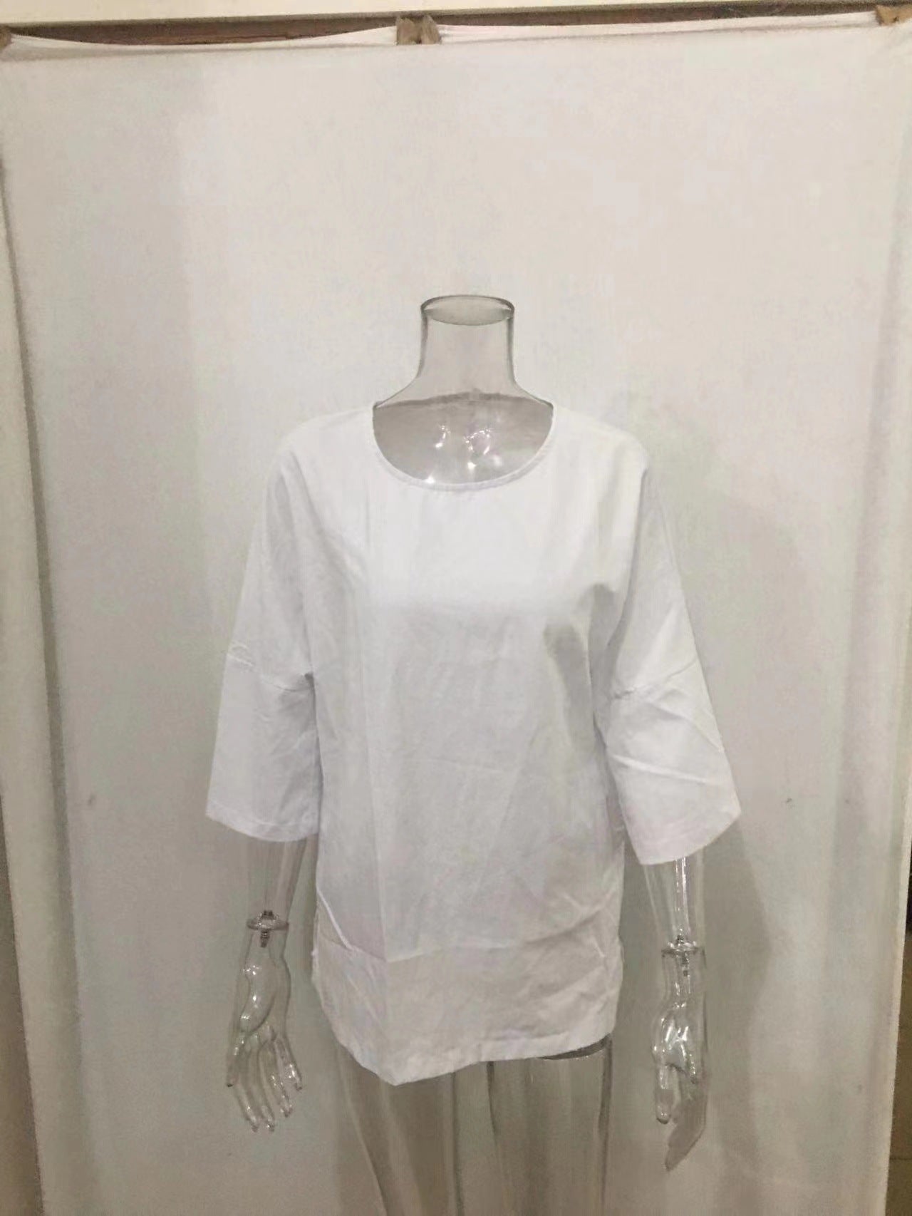 Estilo de viaje Mujeres Camisa de lino de algodón redonda de manga de tres cuartos